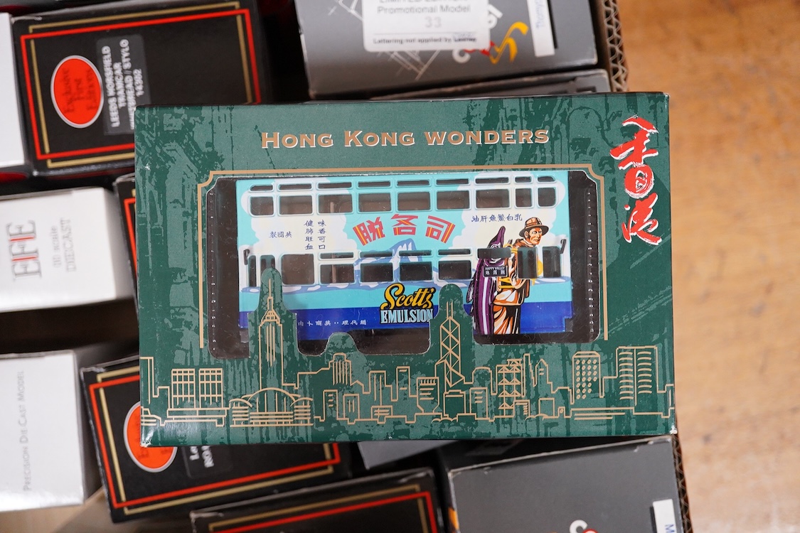 Forty-five boxed diecast trams, buses and other commercial vehicles by Corgi Classic, Corgi OOC, and EFE, operators include Leeds tram, the Tate & Lyle Story set, Blackpool Corporation Transport (seven examples), Thornyc